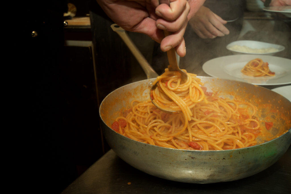 red sauce pasta being made