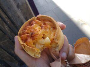 person_eating_macaroni_pie_Edinburgh