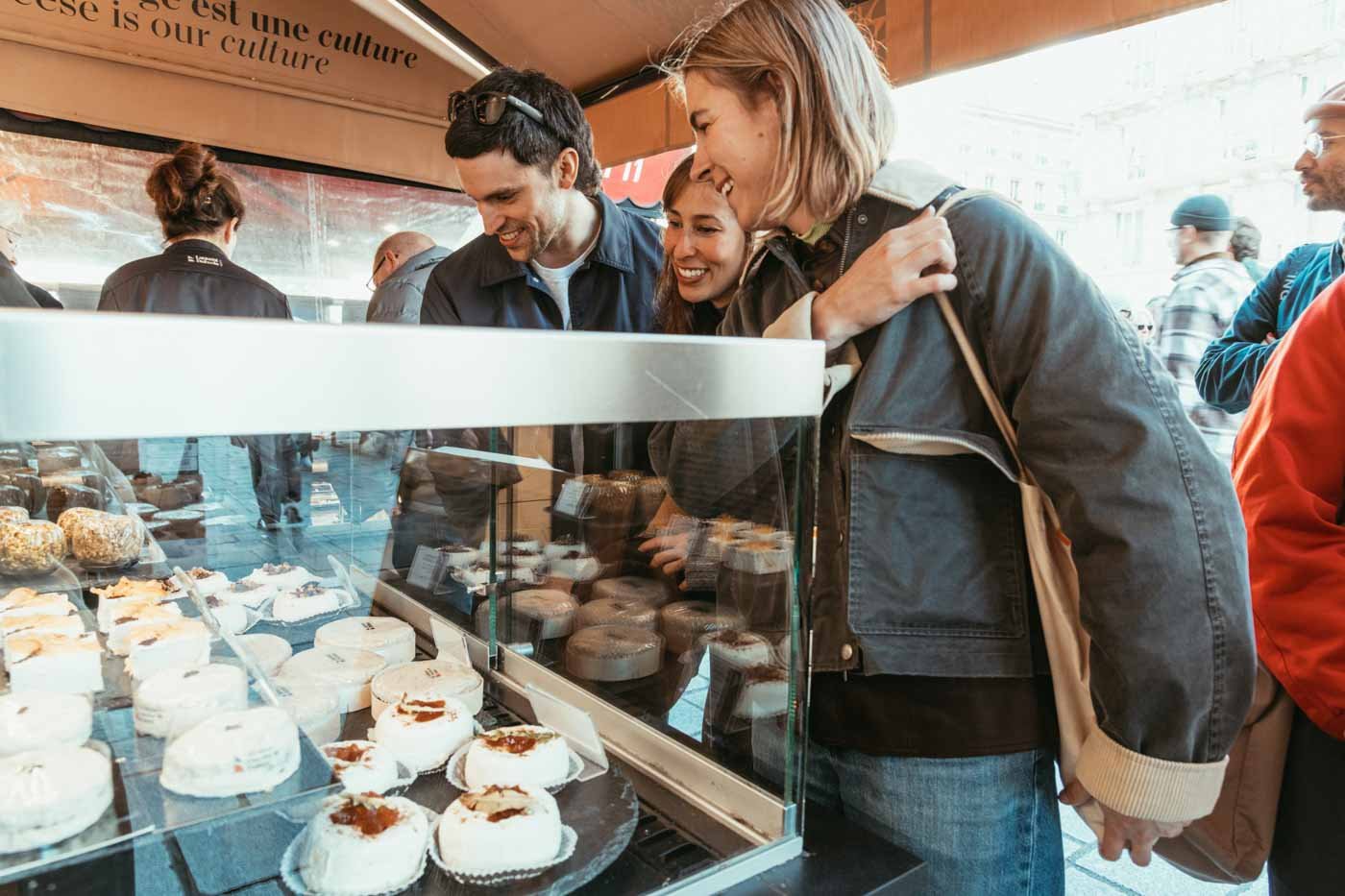 tour_group_looking_at_selection_at_Laurent_Dubois_Cheeseshop_Paris