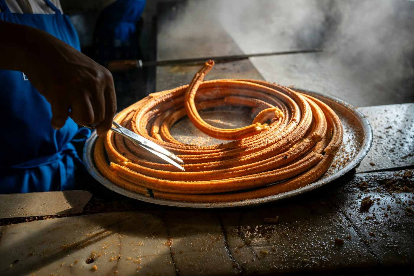 Chef_cooking_churros_Seville