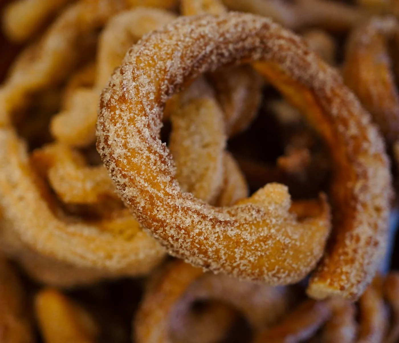 Close_up_of_sugar_glazed_churros_Seville